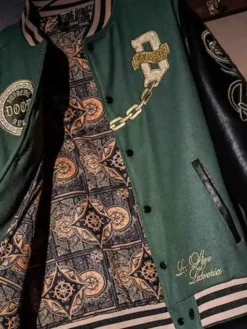 Close view of Avengers Doomsday NYCC 2026 Heroes and Villains Doctor Doom Supreme Ruler Without Rival Green Varsity Jacket