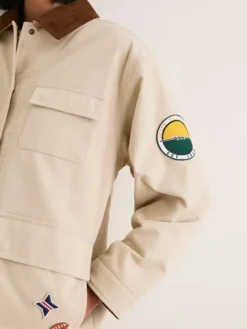 NFL Green Bay Packers Tuckernuck Women's Full-Snap Varsity Barn Jacket Stone